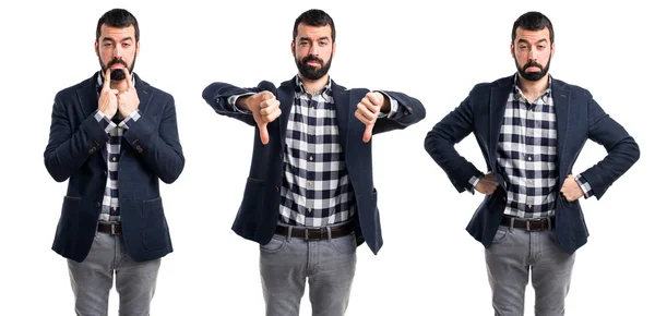 Hombre haciendo mala señal —  Fotos de Stock