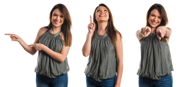 Young girl pointing to the front — Stock Photo, Image