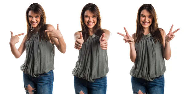 Young girl with thumb up — Stock Photo, Image