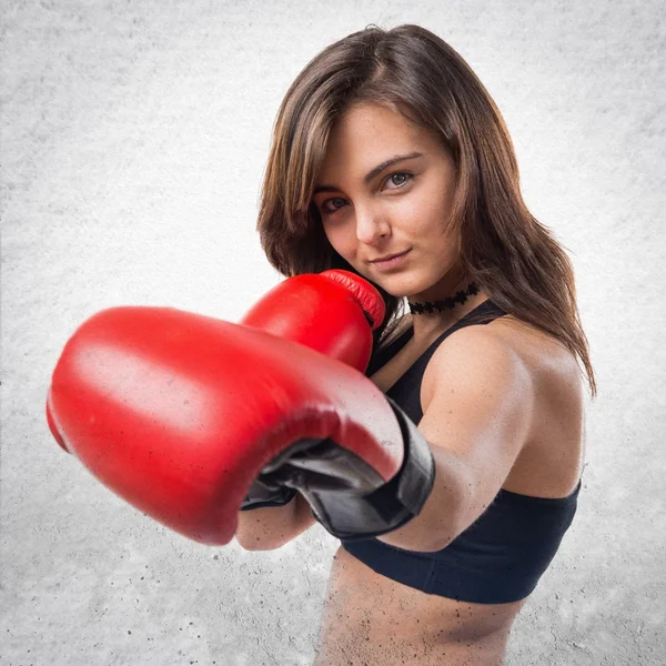 Young girl with boxing gloves — Stock Photo, Image