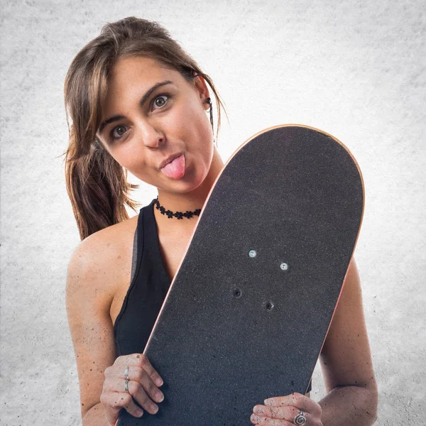 Young girl with skateboard — Stock Photo, Image