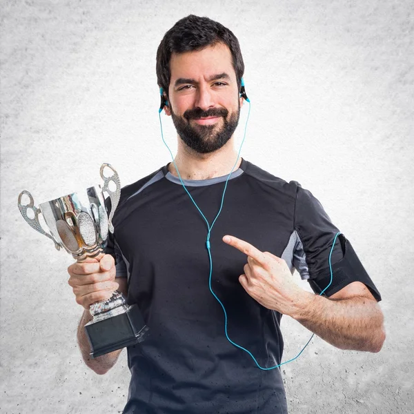 Sportman holding a trophy