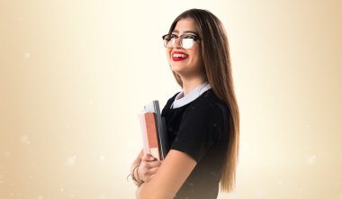 Birkaç üniversite not tutan kız