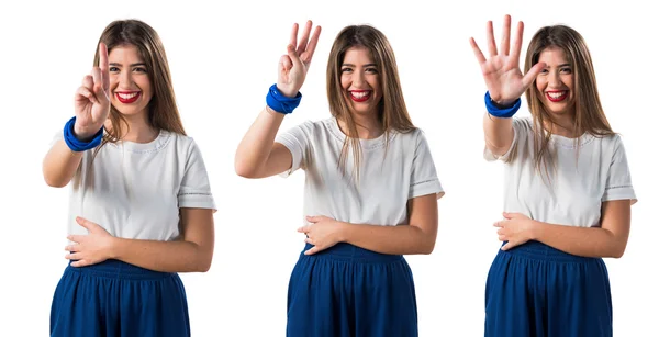 Young girl counting five — Stock Photo, Image