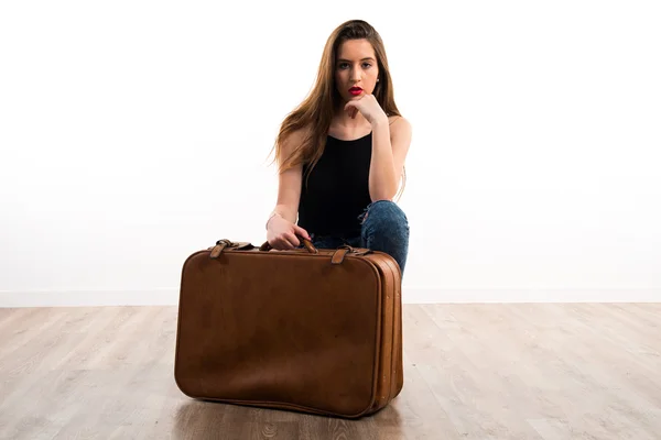 Young girl holding a briefcase — Stock Photo, Image