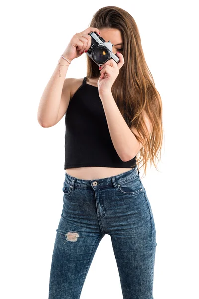 bir kamera tutan genç kız