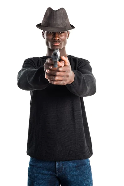 Μαύρο άνθρωπος που κρατά ένα πιστόλι — Φωτογραφία Αρχείου