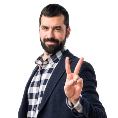 Zafer hareketi yapan adam.