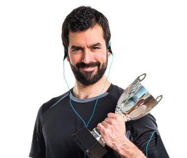 Bir kupa tutan Sportman