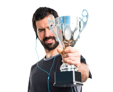 Bir kupa tutan Sportman