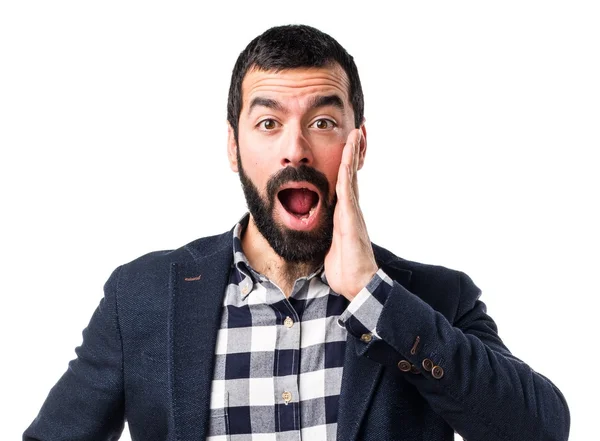 Sürpriz bir jest yapan yakışıklı erkek