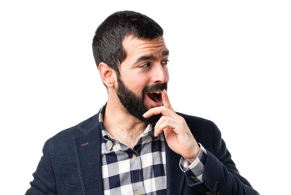 Handsome man doing surprise gesture — Stock Photo, Image