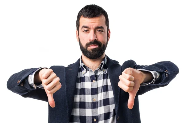 Hombre haciendo mala señal — Foto de Stock