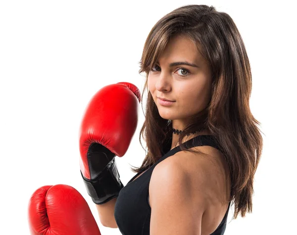 Jovem com luvas de boxe — Fotografia de Stock