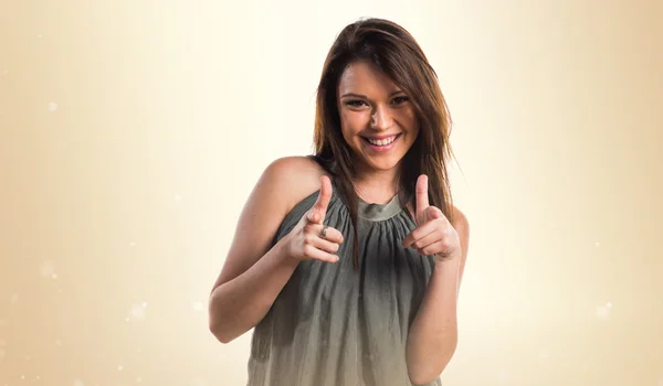 Young girl pointing to the front — Stock Photo, Image