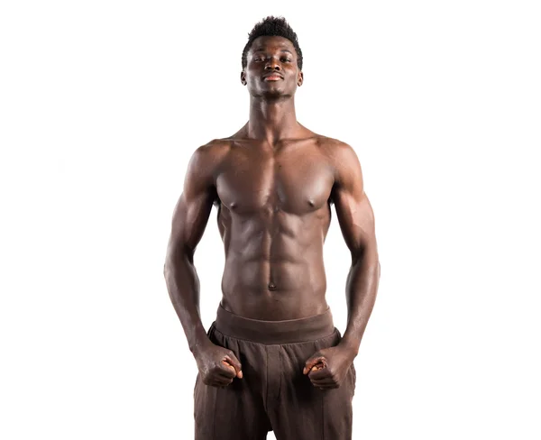Hombre negro fuerte posando en el estudio — Foto de Stock