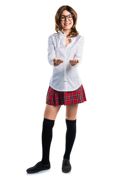 Student girl holding something — Stock Photo, Image