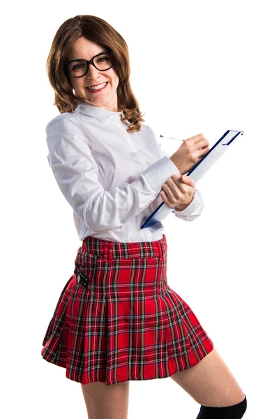 Estudante menina segurando notas escolares — Fotografia de Stock