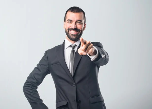 Businessman pointing to the front — Stock Photo, Image