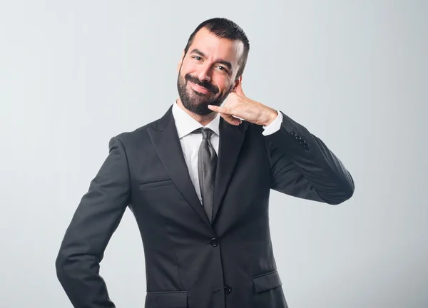 Zakenman telefoon gebaar maken — Stockfoto