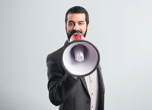 Man schreeuwen door megafoon — Stockfoto