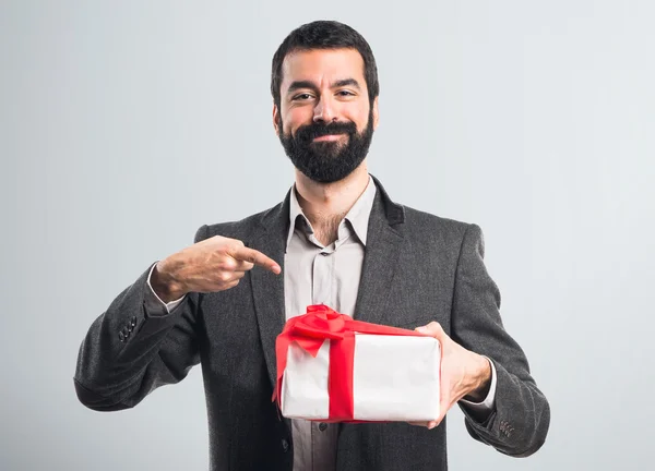 Man holding a gift — Stock Photo, Image