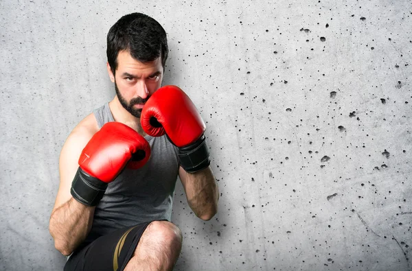 Deportista con guantes de boxeo — Foto de Stock