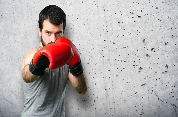 Deportista con guantes de boxeo — Foto de Stock