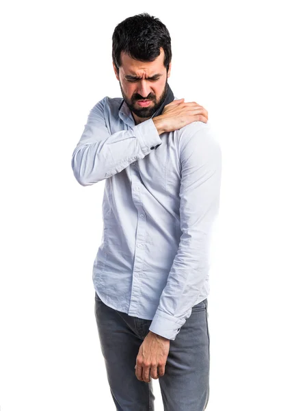 Людина з болем в плечі — стокове фото