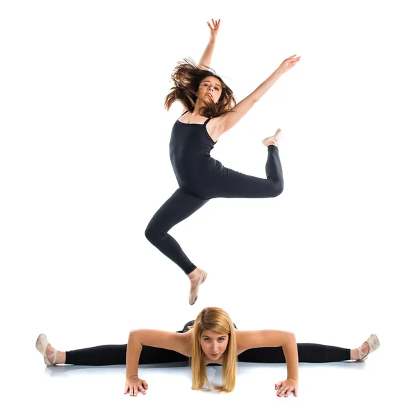 Två flickor dansa balett över isolerade bakgrund — Stockfoto