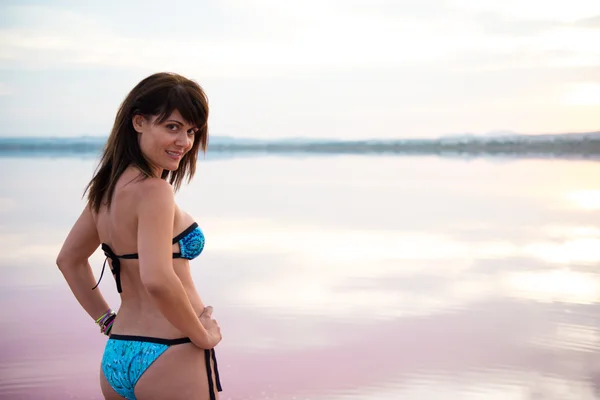 Pretty woman in a colorful lake — Stock Photo, Image