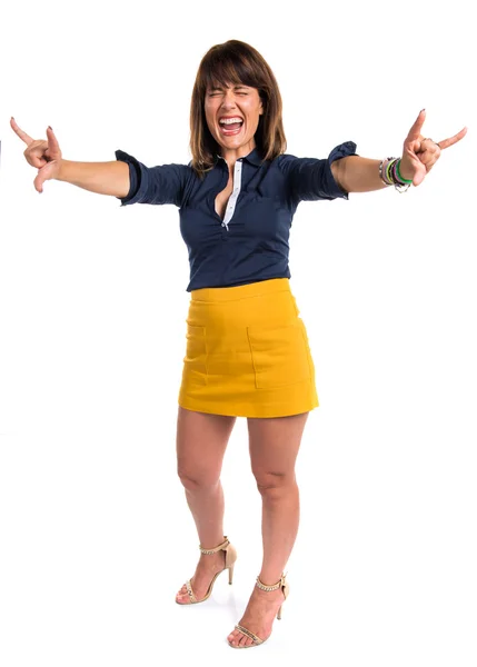 Pretty woman making horn gesture — Stock Photo, Image