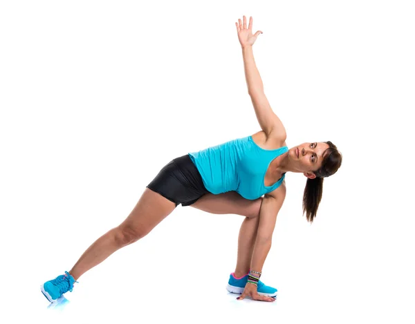 Bella donna sportiva stretching — Foto Stock