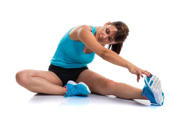 Bastante deporte mujer estiramiento Imagen de stock