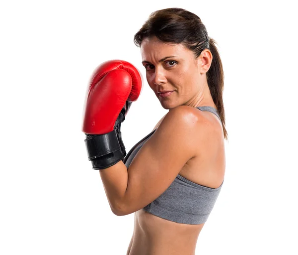 Mujer deportiva con guantes de boxeo — Foto de Stock
