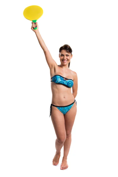 Mujer en bikini azul jugando tenis de playa —  Fotos de Stock