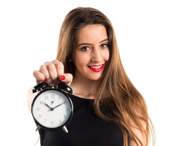 Menina segurando relógio vintage — Fotografia de Stock