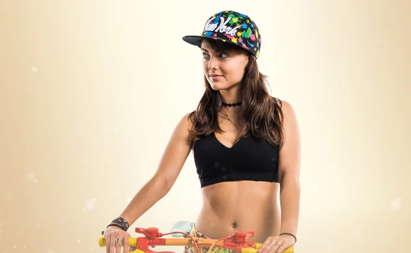 Young girl with colorful bike — Stock Photo, Image