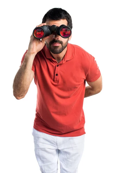 Bello uomo con binocolo — Foto Stock