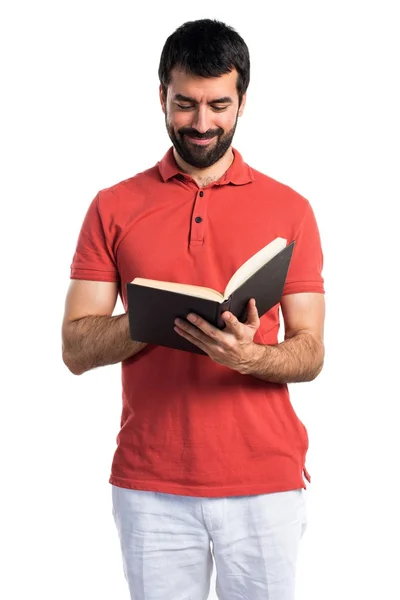 Pohledný muž čtení kniha — Stock fotografie