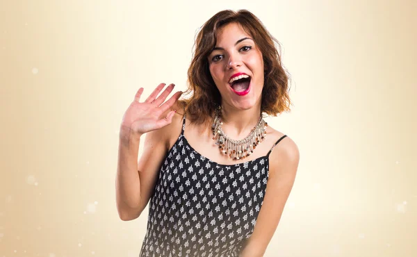 Pretty woman doing surprise gesture — Stock Photo, Image