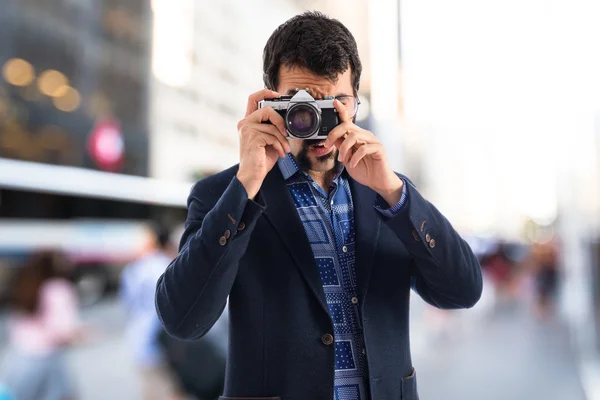 Vintage ung man fotografera — Stockfoto