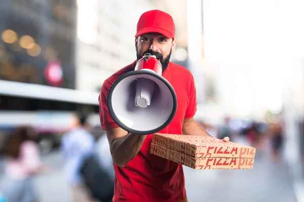 Доставщик пиццы кричит на мегафон — стоковое фото