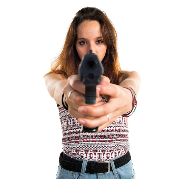 Flicka som håller en pistol — Stockfoto