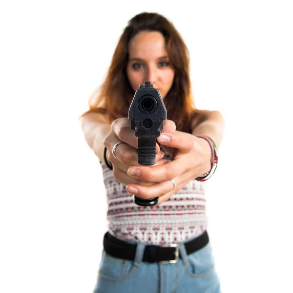 Flicka som håller en pistol — Stockfoto