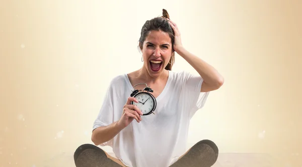 Girl holding vintage clock — Stock Photo, Image