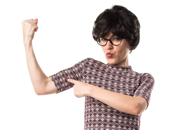 Girl making strong gesture — Stock Photo, Image