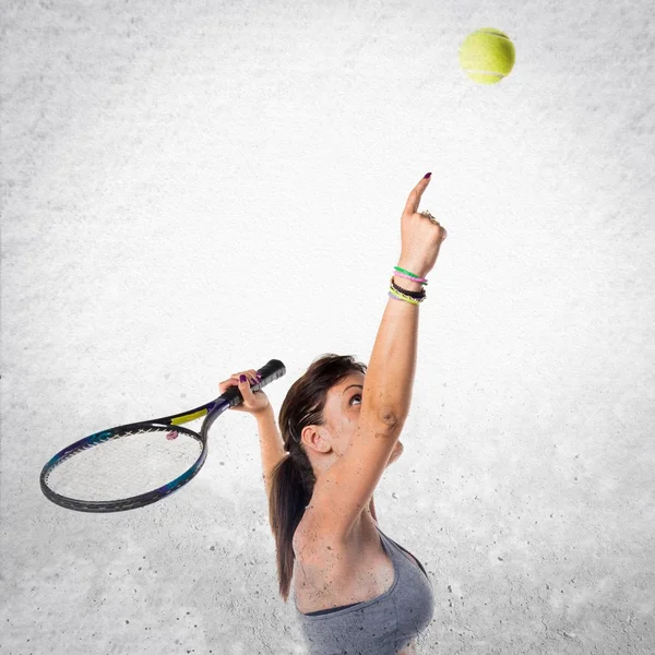 Pretty woman playing tennis — Stock Photo, Image