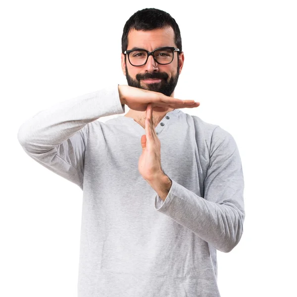 Muž v pyžamu časový limit gesto — Stock fotografie