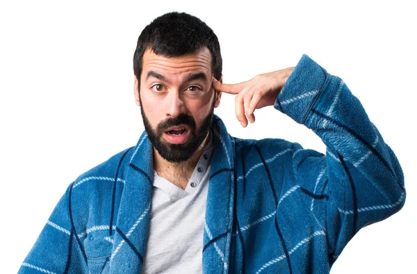 Man in dressing gown making crazy gesture — Stock Photo, Image